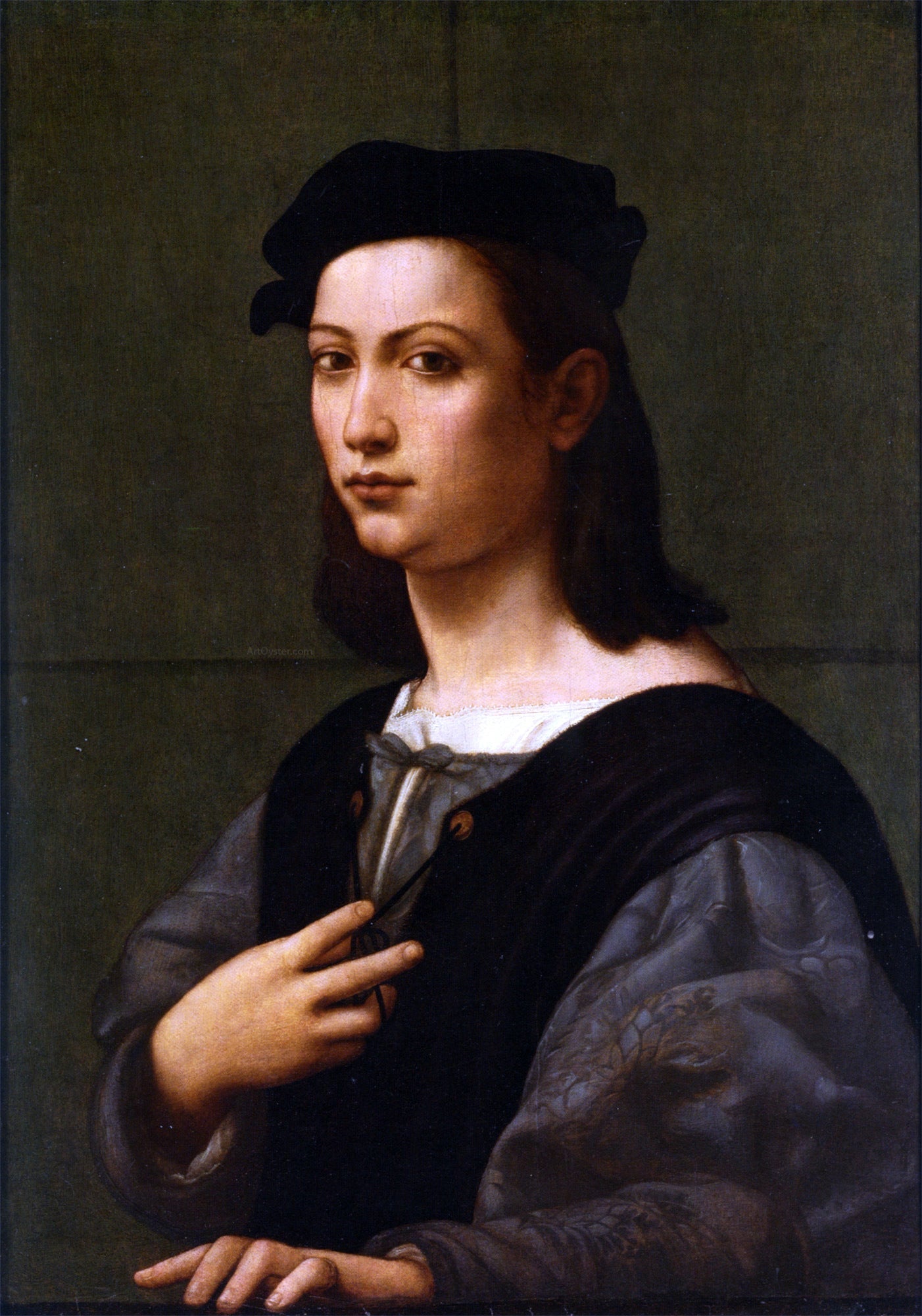  Giuliano Bugiardini Portrait of a young gentleman half length in a blue Douiblet and white shirt with black hair - Canvas Print